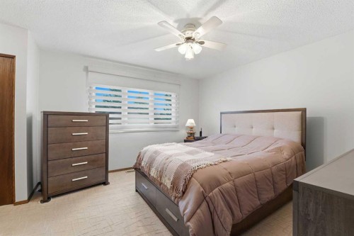 77 Allan Close, Red Deer, AB - Indoor Photo Showing Bedroom