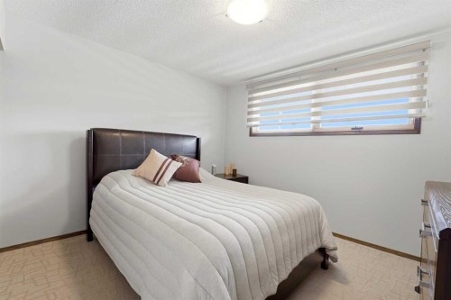 77 Allan Close, Red Deer, AB - Indoor Photo Showing Bedroom