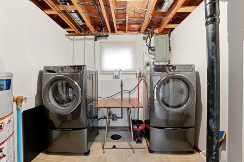77 Allan Close, Red Deer, AB - Indoor Photo Showing Laundry Room