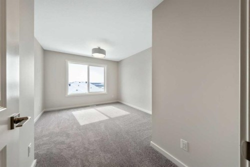 366 Heritage Boulevard, Cochrane, AB - Indoor Photo Showing Other Room