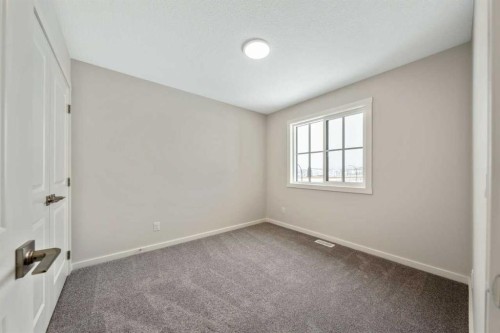 366 Heritage Boulevard, Cochrane, AB - Indoor Photo Showing Other Room