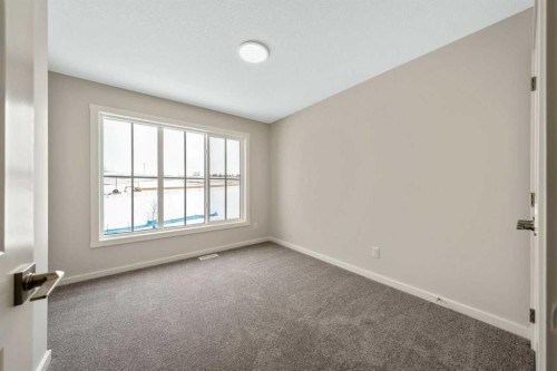 366 Heritage Boulevard, Cochrane, AB - Indoor Photo Showing Other Room