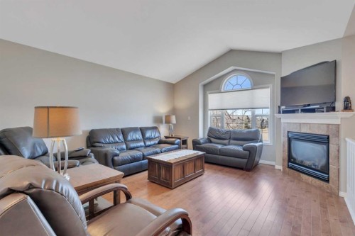 68 Iverson Close, Red Deer, AB - Indoor Photo Showing Living Room With Fireplace