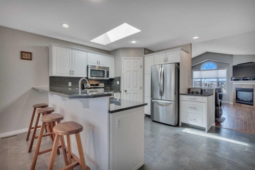 68 Iverson Close, Red Deer, AB - Indoor Photo Showing Kitchen With Stainless Steel Kitchen With Upgraded Kitchen