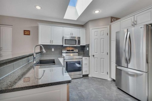 68 Iverson Close, Red Deer, AB - Indoor Photo Showing Kitchen With Stainless Steel Kitchen