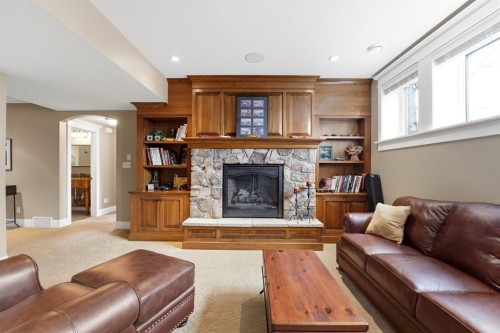 31 Ashley Close, Red Deer, AB - Indoor Photo Showing Living Room With Fireplace