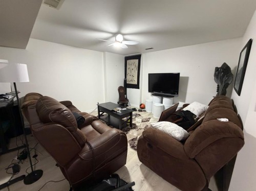4741 49A Avenue, Lacombe, AB - Indoor Photo Showing Living Room
