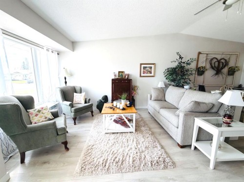 4741 49A Avenue, Lacombe, AB - Indoor Photo Showing Living Room