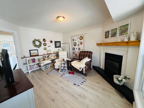 4741 49A Avenue, Lacombe, AB - Indoor With Fireplace