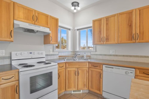 74 Jack Crescent, Red Deer, AB - Indoor Photo Showing Kitchen With Double Sink