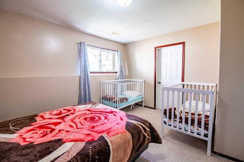 5817 60 Avenue, Red Deer, AB - Indoor Photo Showing Bedroom