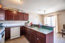 5817 60 Avenue, Red Deer, AB  - Indoor Photo Showing Kitchen With Double Sink 