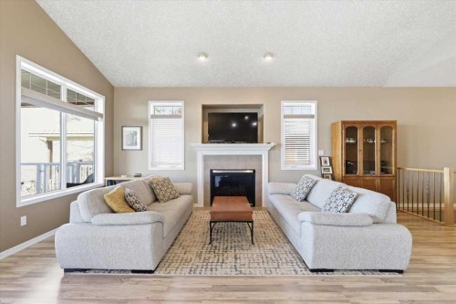 72 Beach Avenue, Itaska Beach, AB - Indoor Photo Showing Living Room With Fireplace