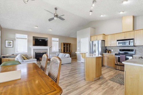72 Beach Avenue, Itaska Beach, AB - Indoor Photo Showing Kitchen With Fireplace