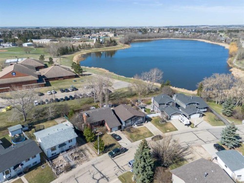 39 Cedar Crescent, Lacombe, AB - Outdoor With Body Of Water With View