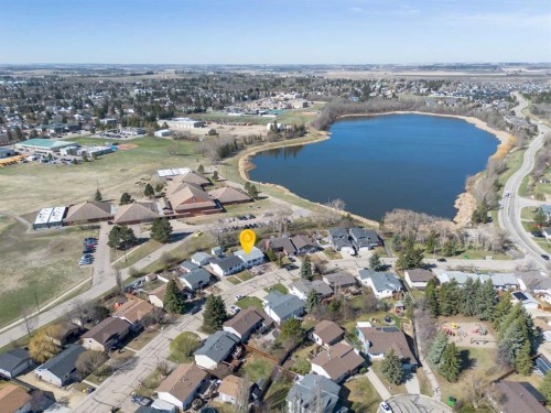 39 Cedar Crescent, Lacombe, AB - Outdoor With Body Of Water With View