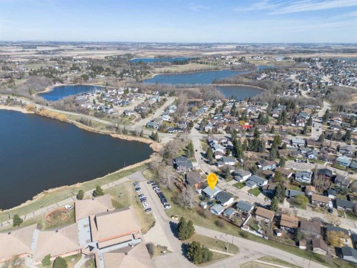 39 Cedar Crescent, Lacombe, AB - Outdoor With Body Of Water With View