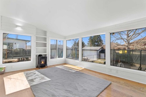 39 Cedar Crescent, Lacombe, AB - Indoor With Fireplace