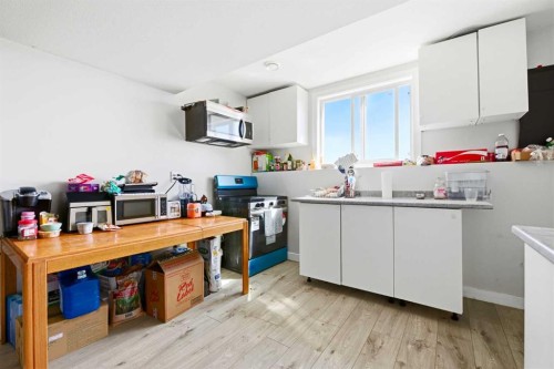 7002 50 Avenue, Camrose, AB - Indoor Photo Showing Kitchen With Double Sink