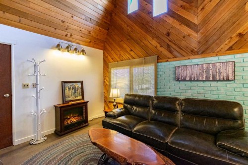 19 4 Street, White Sands, AB - Indoor Photo Showing Living Room With Fireplace
