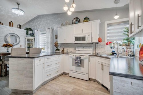 17 Keast Way, Red Deer, AB - Indoor Photo Showing Kitchen With Double Sink