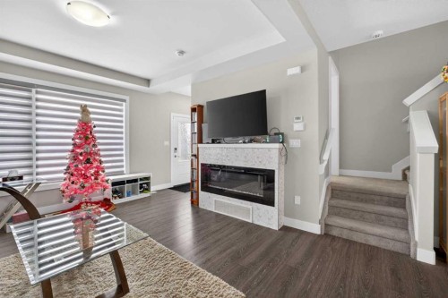 994 Berg Place, Leduc, AB - Indoor Photo Showing Living Room With Fireplace