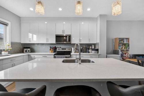 994 Berg Place, Leduc, AB - Indoor Photo Showing Kitchen With Stainless Steel Kitchen With Double Sink With Upgraded Kitchen