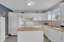 4929 Womacks Road, Blackfalds, AB  - Indoor Photo Showing Kitchen With Double Sink 