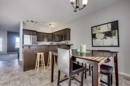 111-50 Lucky Place, Sylvan Lake, AB - Indoor Photo Showing Dining Room