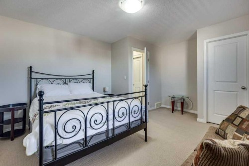 111-50 Lucky Place, Sylvan Lake, AB - Indoor Photo Showing Bedroom