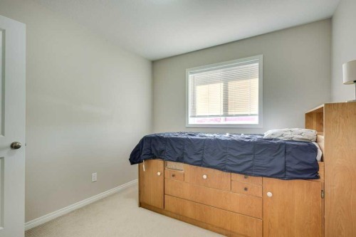 111-50 Lucky Place, Sylvan Lake, AB - Indoor Photo Showing Bedroom