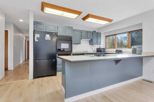 23 Newcombe Crescent, Red Deer, AB - Indoor Photo Showing Kitchen With Upgraded Kitchen