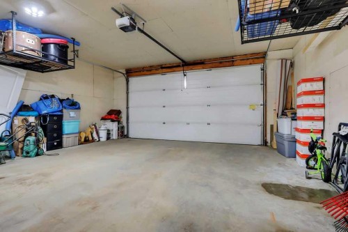 14 Cedar Square, Blackfalds, AB - Indoor Photo Showing Garage