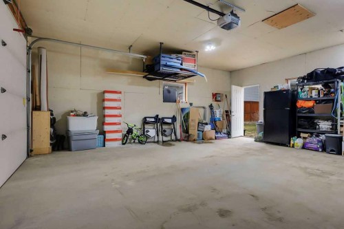 14 Cedar Square, Blackfalds, AB - Indoor Photo Showing Garage