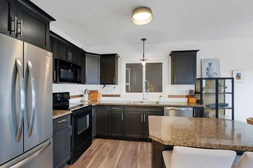 14 Cedar Square, Blackfalds, AB - Indoor Photo Showing Kitchen With Upgraded Kitchen