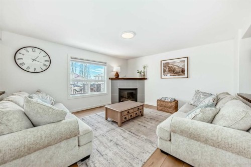 26 Lawson Close, Red Deer, AB - Indoor Photo Showing Living Room With Fireplace