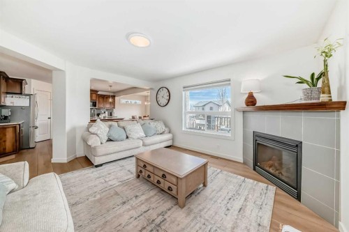 26 Lawson Close, Red Deer, AB - Indoor Photo Showing Living Room With Fireplace
