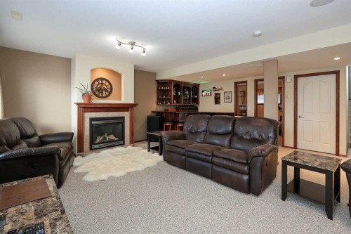 50 Donald Close, Red Deer, AB - Indoor Photo Showing Living Room With Fireplace