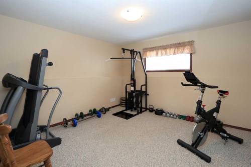 50 Donald Close, Red Deer, AB - Indoor Photo Showing Gym Room