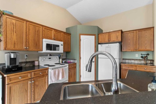 36 Lanterman Close, Red Deer, AB - Indoor Photo Showing Kitchen With Double Sink
