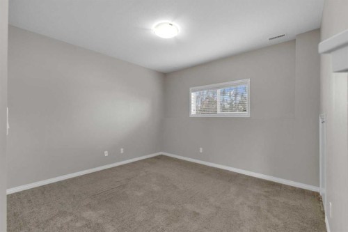 149 Hawkridge Boulevard, Penhold, AB - Indoor Photo Showing Other Room