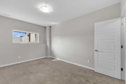 149 Hawkridge Boulevard, Penhold, AB - Indoor Photo Showing Other Room