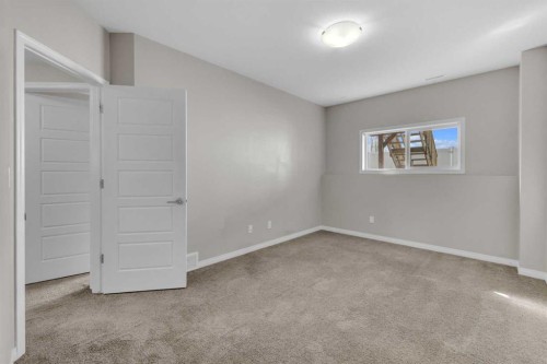 149 Hawkridge Boulevard, Penhold, AB - Indoor Photo Showing Other Room