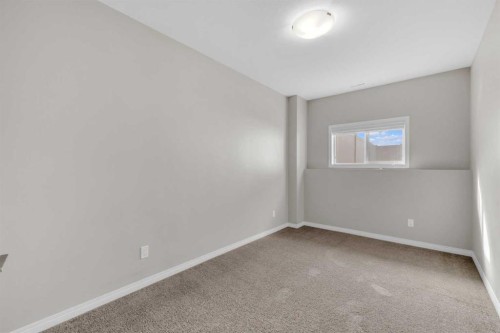 149 Hawkridge Boulevard, Penhold, AB - Indoor Photo Showing Other Room
