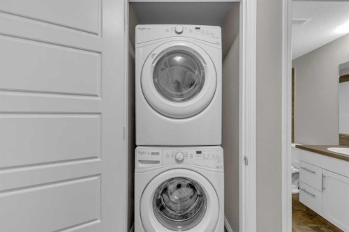 149 Hawkridge Boulevard, Penhold, AB - Indoor Photo Showing Laundry Room