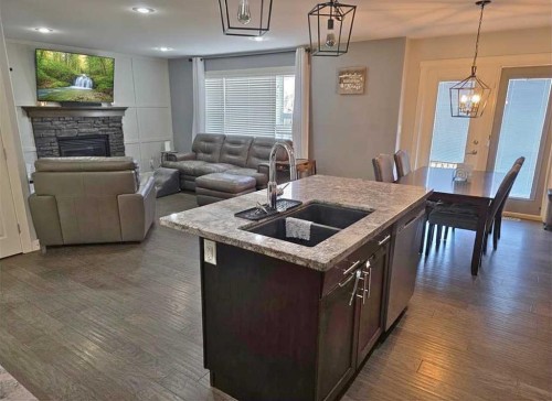 210 Viscount Drive, Red Deer, AB - Indoor With Fireplace