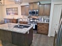 210 Viscount Drive, Red Deer, AB  - Indoor Photo Showing Kitchen With Double Sink With Upgraded Kitchen 
