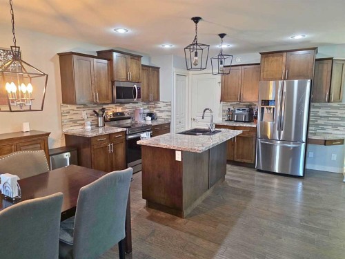 210 Viscount Drive, Red Deer, AB - Indoor Photo Showing Kitchen With Stainless Steel Kitchen With Upgraded Kitchen