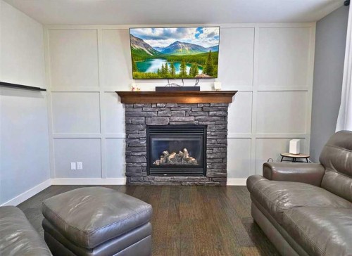 210 Viscount Drive, Red Deer, AB - Indoor Photo Showing Living Room With Fireplace