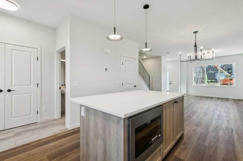 49 Bluerock Hill Sw, Calgary, AB - Indoor With Fireplace